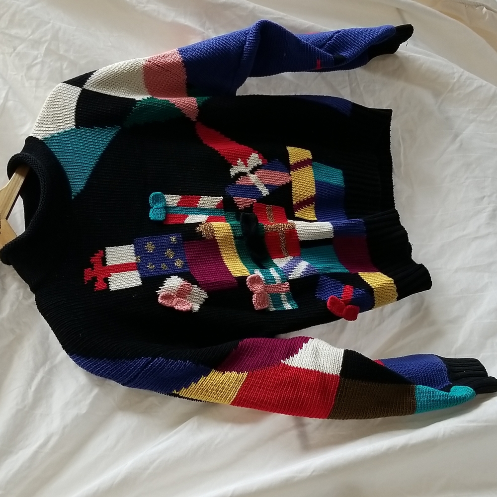 Lisa Nichols shopping themed sweater